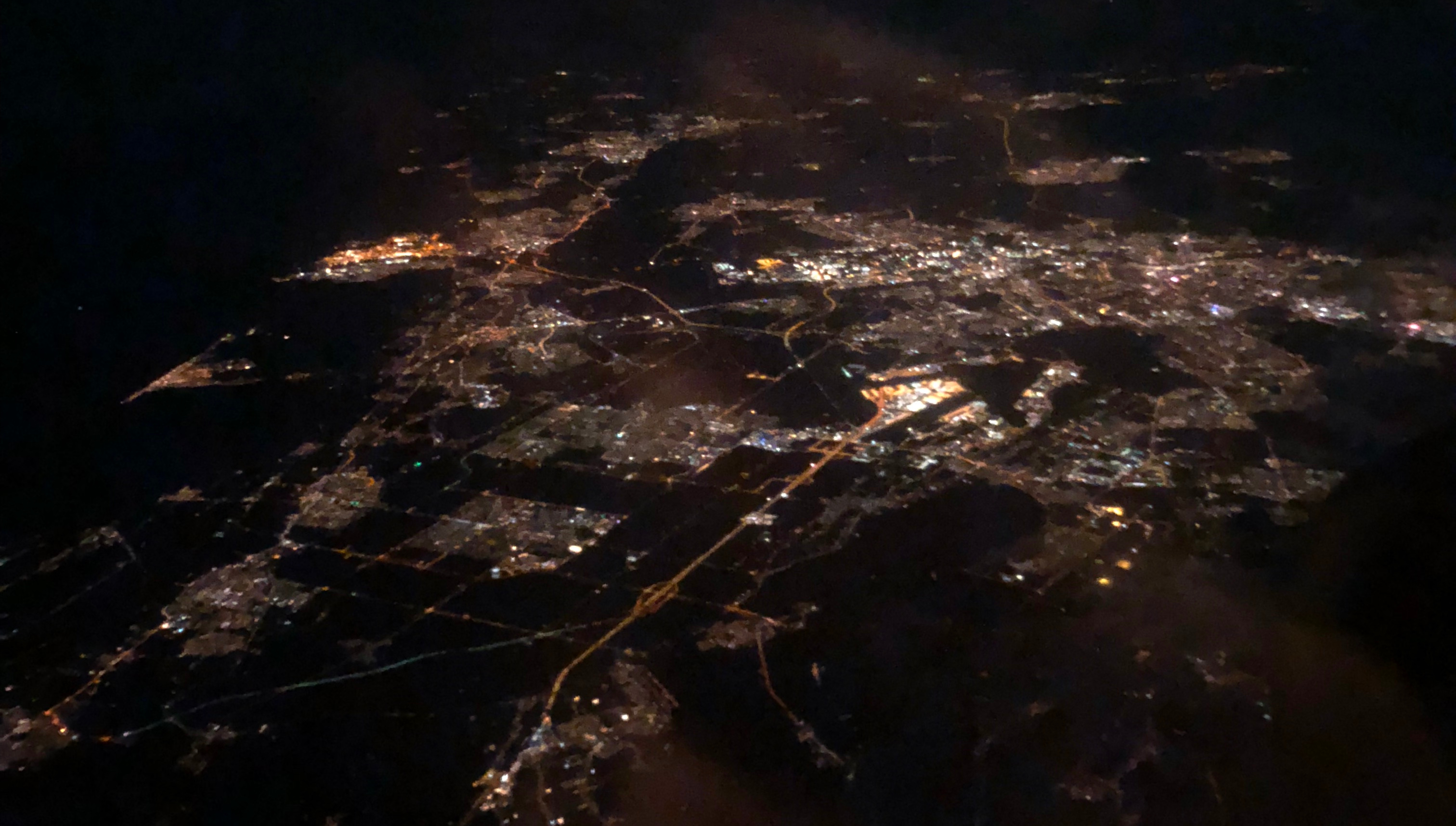 A pictures of some town near Berlin, taken from an aeroplane at night.
